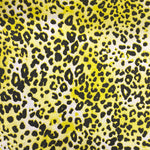 A stretch cotton fabric with a bright yellow and black animal print design all over the fabric. Kayes Textiles Fabrics.