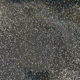A black high gloss plastic fabric with glitter sprinkled all over. Kayes Textiles Fabrics.