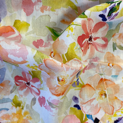 a floaty viscose  fabric with pastel colour watercolour flowers  Kayes Textiles Fabric