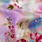 A floaty viscose fabric with pastel coloured flowers on a pastel background  Kayes Textiles Fabrics