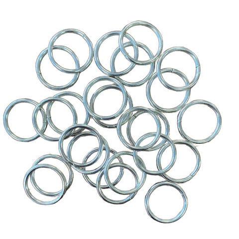 Small metal O-Rings. Kayes Textiles fabrics. 