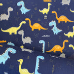 Polycotton Children's Print - Smiling Dinosaurs - Navy Blue - £3.00 Per Metre - Sold by Half Metre