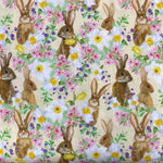 A lemon background with digital printed rabbits amongst flowers. Kayes Textiles Fabrics