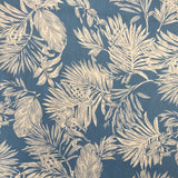 A blue viscose fabric with white brushed lotus leaves all over. Kayes Textiles Fabrics.