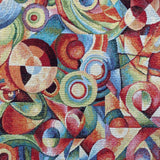 a heavy weight tapestry fabric with geometric circles and swirls in multi colours. Kayes Textiles Fabrics