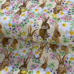 A lemon background with digital printed rabbits amongst flowers. Kayes Textiles Fabrics