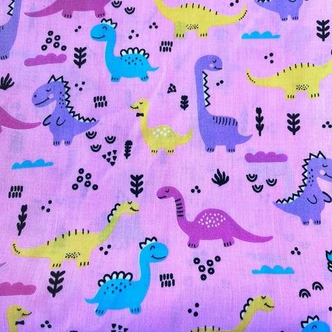 ** Remnant 140906 1.05m x 1.15m Pink Smiling Dinosaurs Polycotton