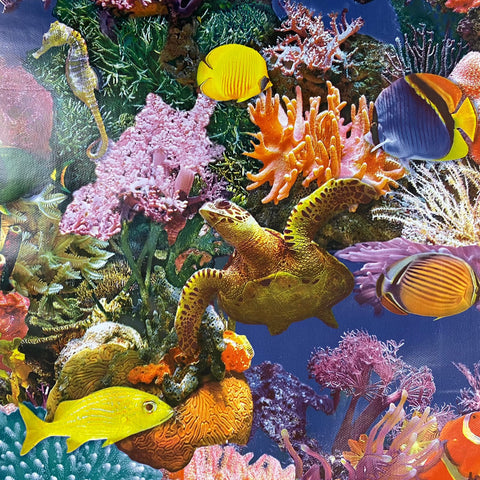 A plastic fabric with a photographic underwater scene including fish, turtles and coral. Kayes Textiles Fabrics. 