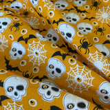 Halloween Polycotton Print - Skulls and Spiders - Orange - £3.00 Per Metre -  Sold by Half Metre