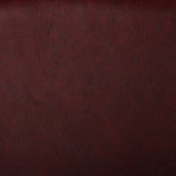 A faux leather fabric with a slight texture in a wine colour. Kayes Textiles Fabrics.