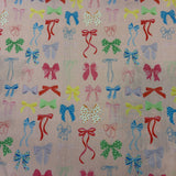 Pretty Multicoloured Bows on Pink Polycotton Print - £3.00 Per Metre -  Sold by Half Metre