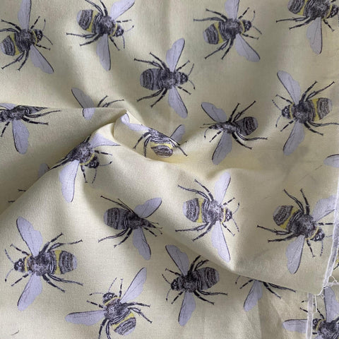 Remnant 210402  2m 100% Cotton Pale Yellow with Grey Bees  - 150cm wide