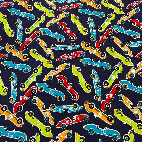 Racing cars race coloured 100% Craft cotton fabric perfect for summer clothes crafts dresses tops nightwear lightweight cool Kayes dressmaking Southend Westcliff sewing fabric shops cool clothes Metre discount cheap 