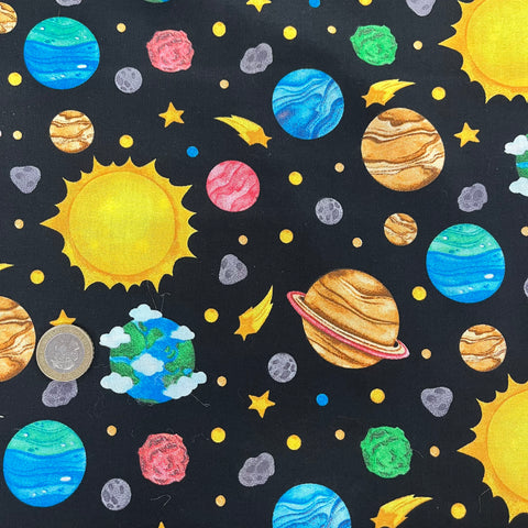 Space themed bright coloured black children’s patchwork craft cotton fabric perfect for summer clothes dresses tops lightweight cool Kayes 100% cotton dressmaking Southend Westcliff sewing fabric cool clothes pattern fabric shops Metre discount cheap 